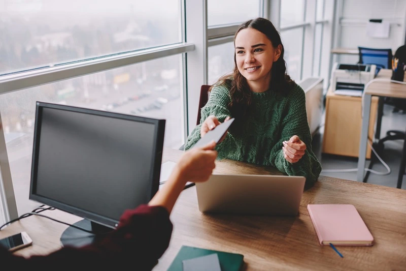 Candidate Discussing Experiences While Answering Amazon Interview Questions During An Interview
