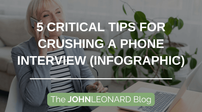 Professional seated at a desk utilizing a laptop during a phone conversation, with overlaid text stating “5 Essential Tips for Succeeding in a Phone Interview (Infographic)” and “The JOHNLEONARD Blog.”