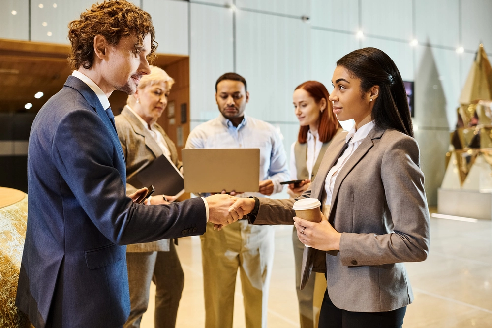 A Candidate Engaging Directly With Several Recruiters At A Career Fair.