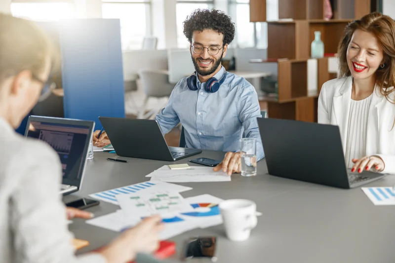 Group Of Professionals Showing Productivity At Work
