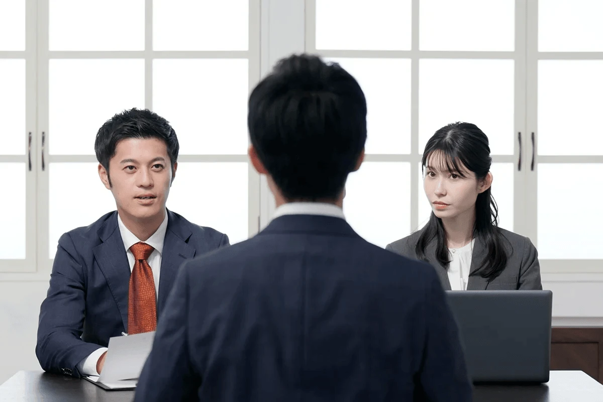 Job Candidate Asking Interview Questions To Ask Employer With Two Interviewers