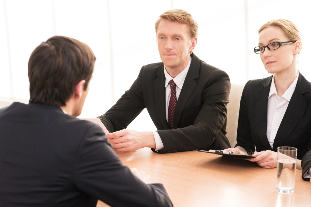 Rear View Of A Man During A Job Interview